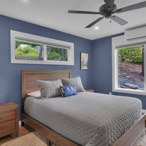Unwind in this spacious primary suite overlooking stunning natural views.