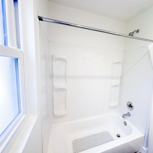 Full bathroom with new bathtub. (Bathroom #2)