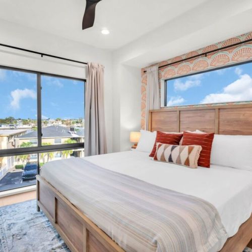 You can see the bay from this room. Water views, mounted tv, closet, black out curtains, and a comfortable mattress.