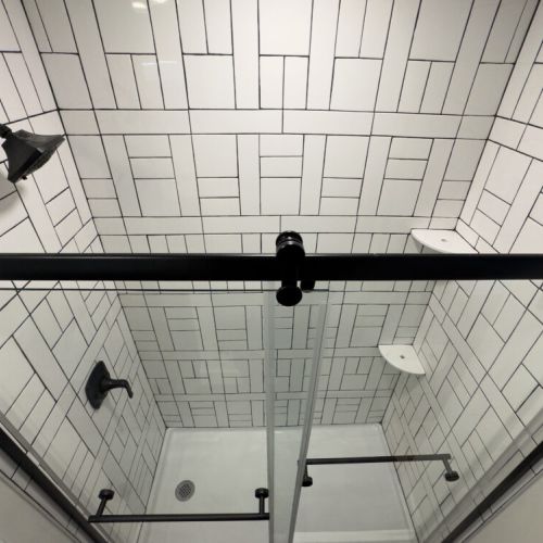 Artistic details in the upstairs shower.