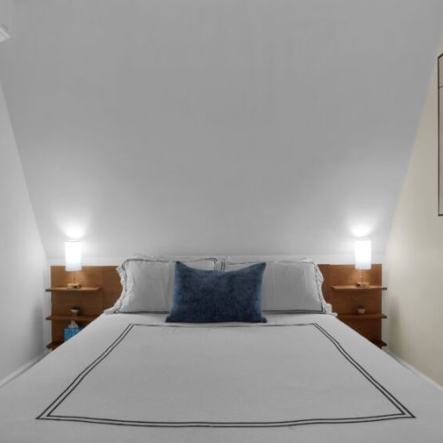 Comfortable main-floor queen bedroom for a restful stay.