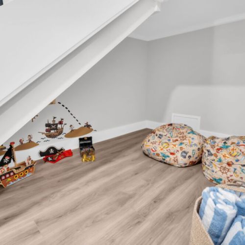 Hidden game nook near the main entry to get the kids excited for vacation.