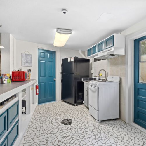 Charming kitchen with thoughtful details and a cozy, inviting atmosphere perfect for cooking and gathering.