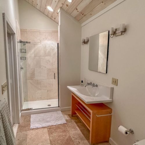 Main Bedroom Bathroom with walk in dual head shower.