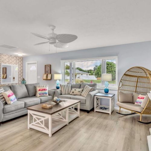 Living Room: Bright and airy space with charming decor, perfect for relaxation and fun!