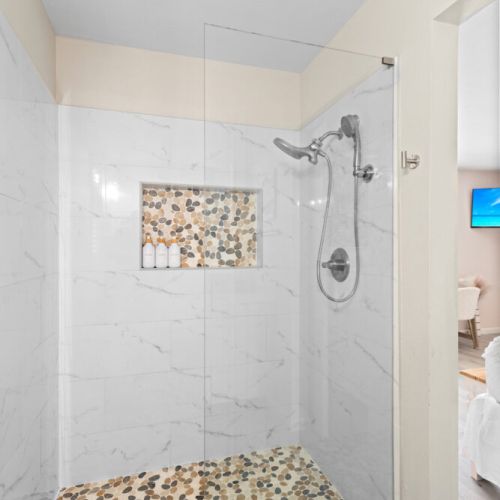 Walk-in shower designed for a refreshing and relaxing experience.