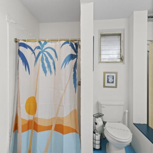 Bright bathroom with beach-inspired touches for a fresh, coastal feel.
