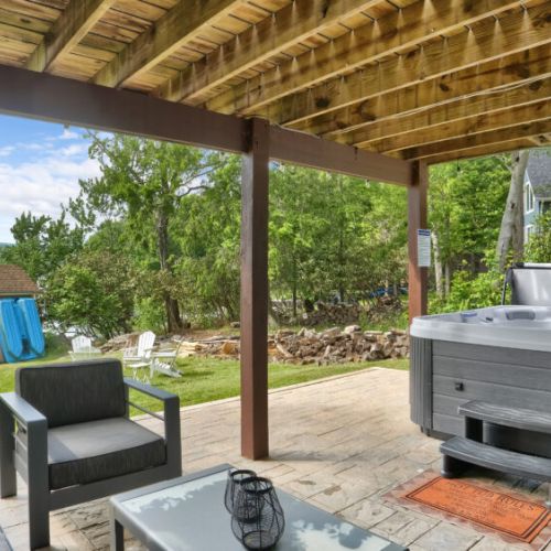 Hot tub and lounge area on the same space for convenience!