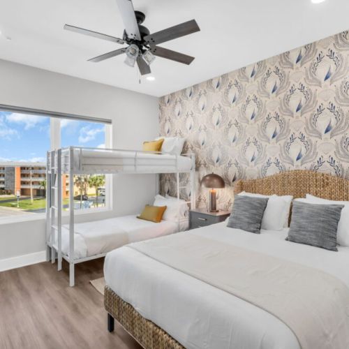 Comfort meets coastal charm in this inviting sleep space.